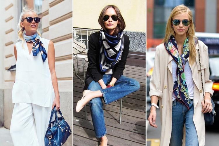 Tres mujeres con gafas de sol y pañuelos de seda estampados en el cuello, combinados con ropa casual y elegante en exterior urbano.